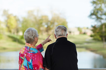 elderly couple standing together 
