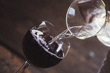 pouring wine into a glass 