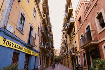 narrow streets between buildings 