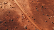Top view of a diagonal path through the desert. 