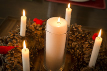 centerpiece, candles, pine cone, wreath, table 