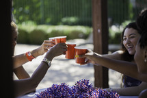 women toasting at a July 4th party 