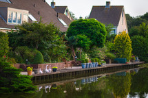 Buildings and plants by the canal