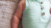 an infants arm 
