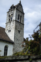 Old stone church with clock tower