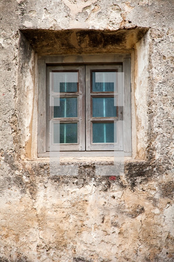 window in old building wall