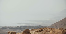 Tracking shot of rocky landscape above the Dead sea in Israel.