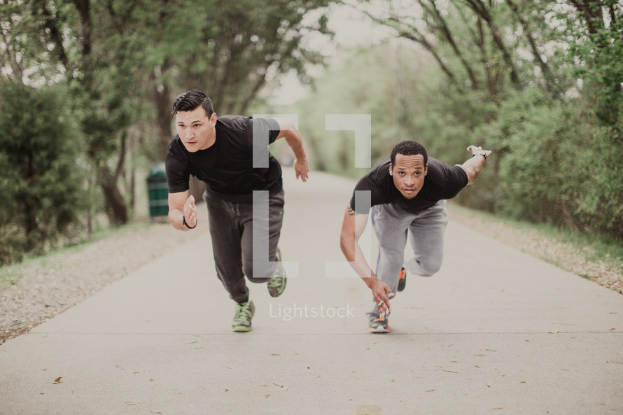 two men running 