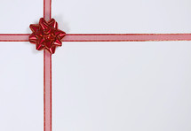 red ribbon and bow gift 