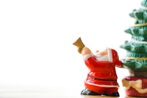 Santa Claus figurine against a white background 