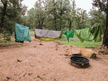 clothes drying on a clothesline at a campsite 