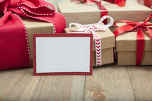 blank gift tag and Christmas gift boxes 