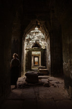 sculptural entryway gate with woman at Ankor Wat, Cambodia