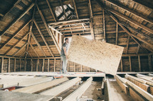 workers building in an attic 