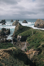 view of rock formations along a New Zealand shore 