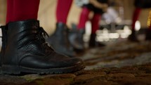 Boots of band players in a popular music festival in Calabria