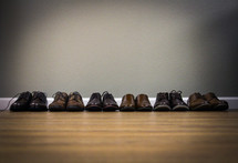 row of brown dress shoes 