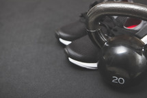 kettle bell weight and sneakers 