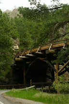 tunnel under a wooden bridge