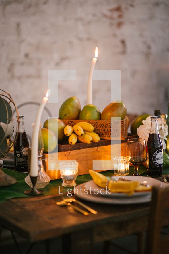 romantic table setting with mangoes 