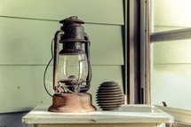 old lantern in a window 