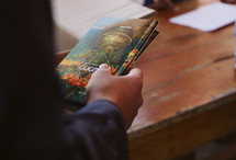 man holding a Bible in Myanmar