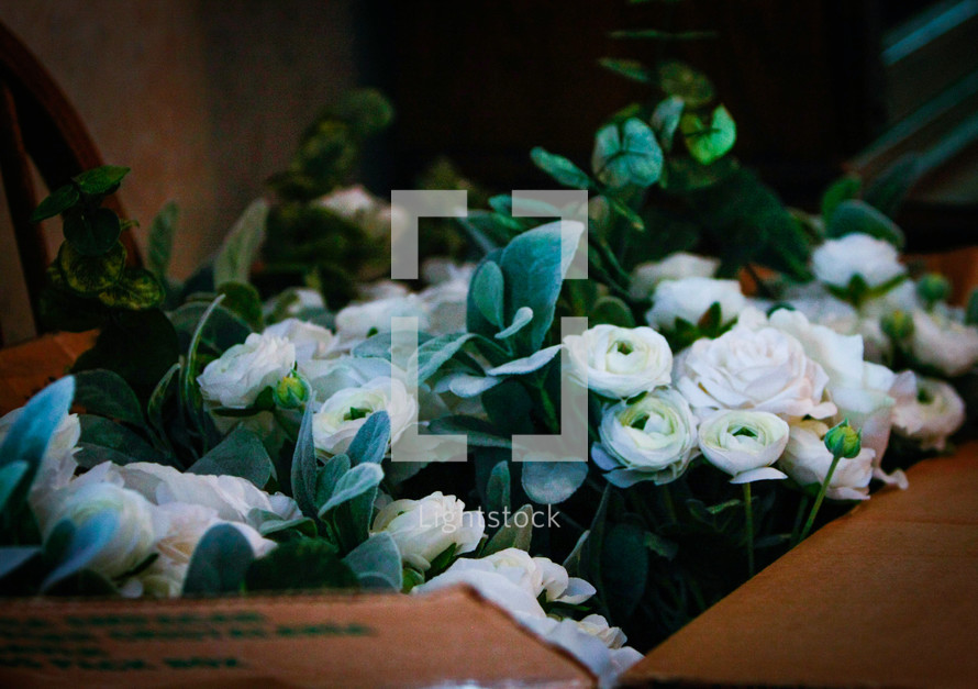 flowers in a cardboard box 