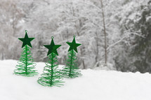 Christmas trees in snow 