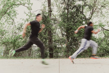 two men running 