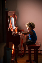 child playing a piano 