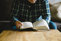 man reading a Bible 