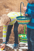 boys looking for Easter eggs 