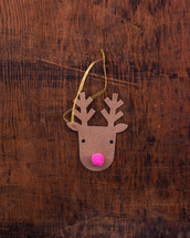 reindeer Christmas ornament on wood 
