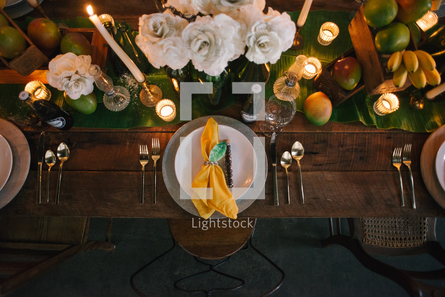 romantic summer table settings at wedding reception 