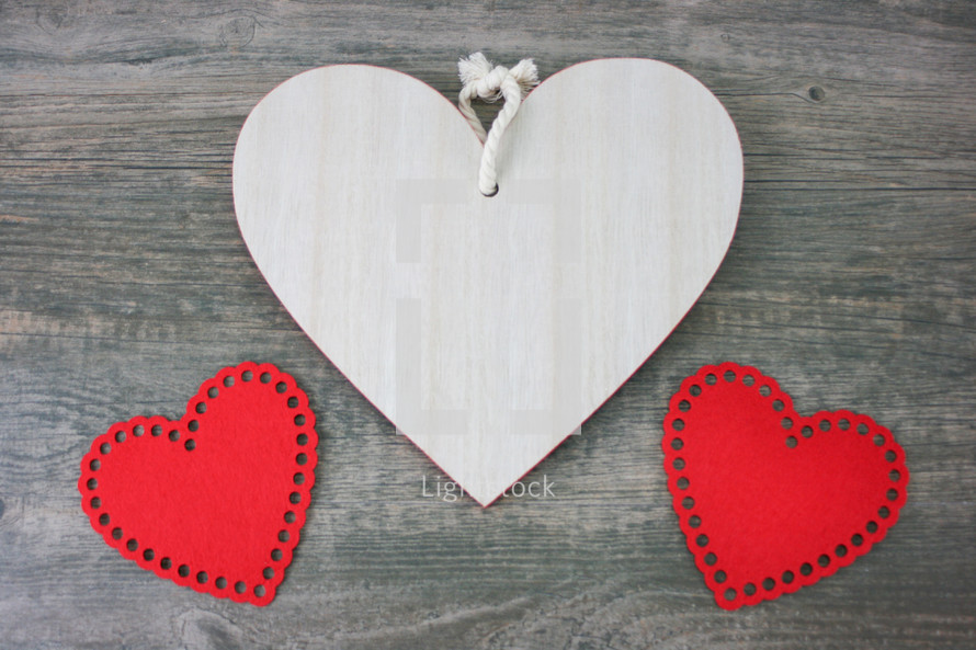 hearts on a wood background 