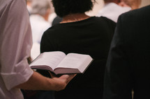 congregation with open hymnals 