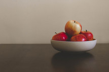 red apples in a bowl 