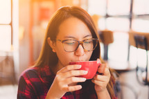 a woman drinking tea 