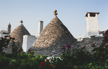 Trulli houses roofs in main touristic district of Alberobello beautiful old historic town, Apulia region, Southern Italy