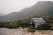 weathered boathouse along the shores of Tasmania 