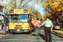 crossing guard and school bus 