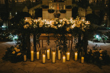 roses and candles on a patio 