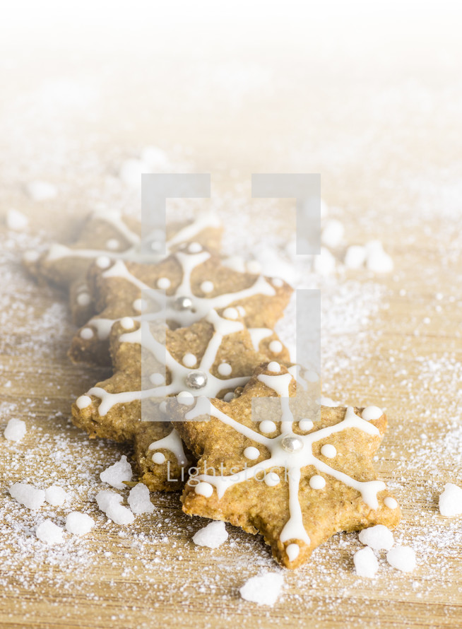 star Christmas cookies and flour 