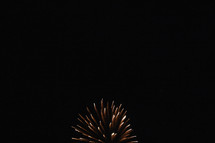 fireworks bursting in a night sky 