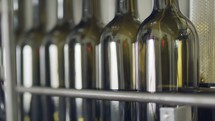 Filling of olive oil bottles in a bottling factory
