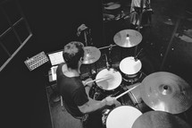 A man playing a drumset