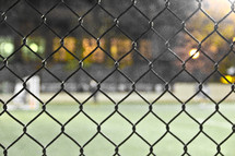 chain link fence and baseball stadium 