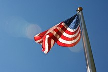American flag flying on a flag pole