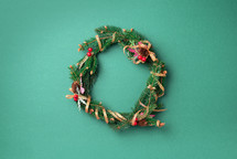 Christmas wreath on a green background