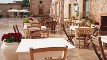 Outdoor restaurant in a typical Italian village. Marzamemi Sicily.
